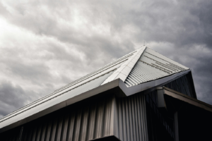 A roof under a cloudy sky