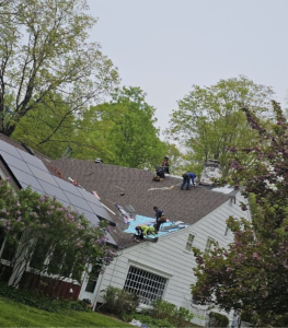 A close-up of a damaged roof