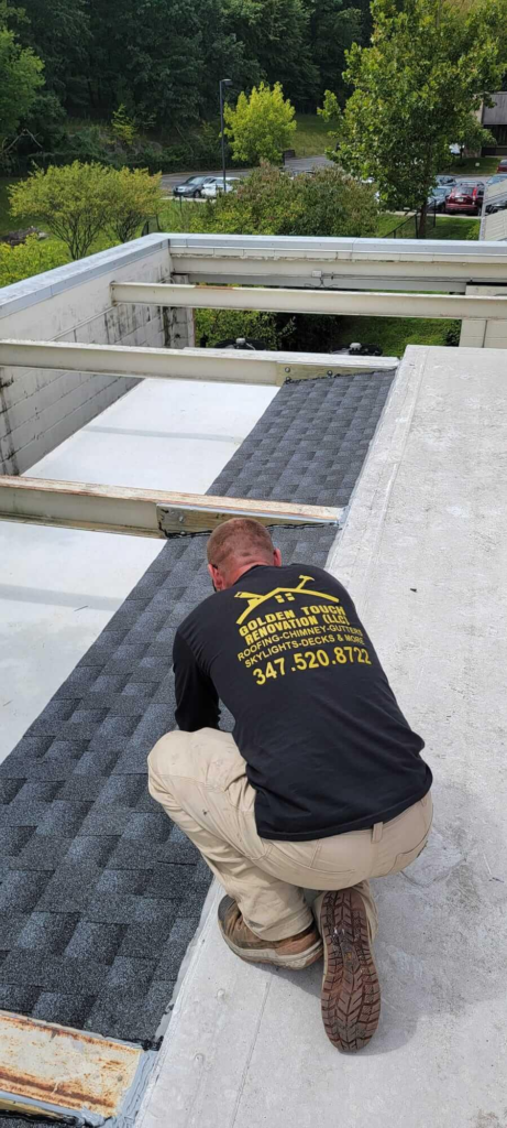 A professional roofer inspecting a commercial roof