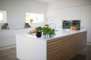 A newly remodeled kitchen featuring sleek countertops.