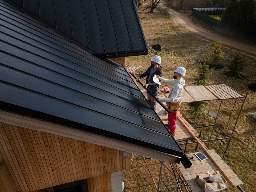 A professional roofer inspecting a residential roof in Yonkers, NY for potential repairs.