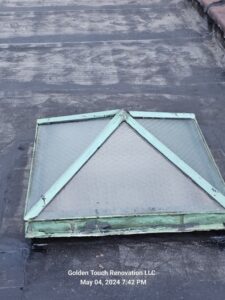 A skylight installed on a roof allowing natural light into the home